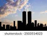 New York skyline silhouette with Twin Towers against the sunset sky. Patriot Day banner. 9.11.2001