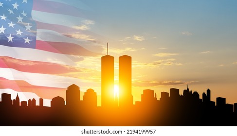 New York skyline silhouette with Twin Towers and USA flag at sunset. 09.11.2001 American Patriot Day banner. NYC World Trade Center. - Shutterstock ID 2194199957