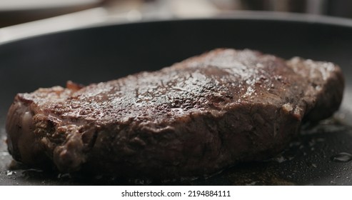 New York Steak On Nonstick Pan, Wide Photo