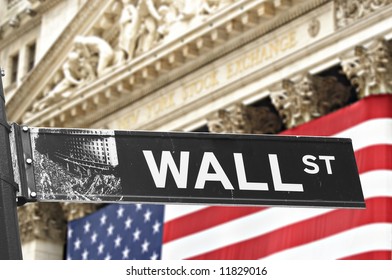 New York Stock Exchange With Wall Street Sign In Front