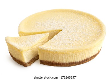 New York Style Cheesecake With A Slice Cut Out Isolated On White. High Angle.