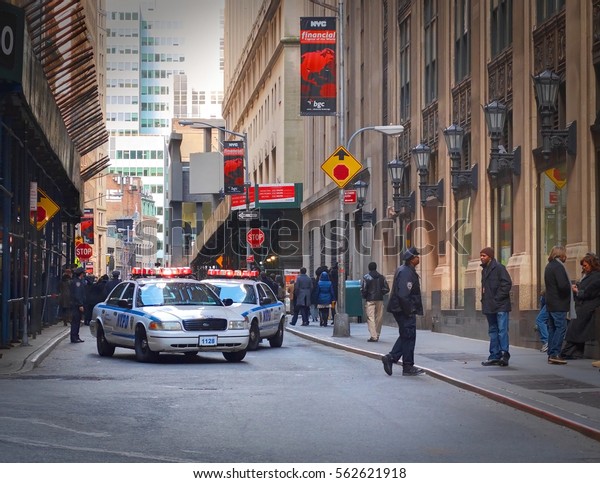 NEW YORK TIMES\
SQUARE, APR,24, 2015: NYPD New York Police Department closed off\
blocked New York street for movie making crew. No entrance for not\
authorized people. 