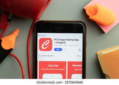 New York, United States - 7 November 2020: Phone Screen Close-up With Cougar Dating CougarD Mobile App Logo On Display, Illustrative Editorial.