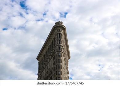 New York, New York / United States Of America - July 9 2016: Flat Iron Building Facade, One Of The First Skyscrapers Ever Built, With NYC Fifth 