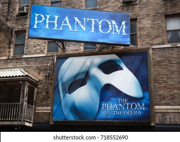 NEW YORK – UNITED STATES OF AMERICA, April 10, 2014 : The advertising billboard of famous show on the old building named "The Phantom of the opera", New York, USA
