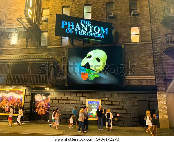 NEW\
YORK – UNITED STATES OF AMERICA, , AUGUST 17 2019  : The\
advertising billboard of famous show on the old building named\
\
