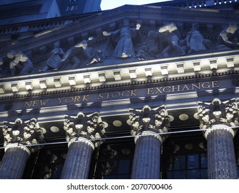 New York, New York  United States - August 31 2021:  The New York Stock Exchange NYSE 11 Wall Street in Manhattan New York City dark summer evening.
