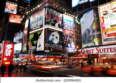New York, United States - December 11, 2010: Nighttime in Times Square features with Broadway Theaters and is a symbol of New York City.