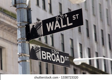 NEW YORK, UNITED STATES - June 3, 2017: Closeup Of Street Sign In The Corner Of Wall Street And Broad Street