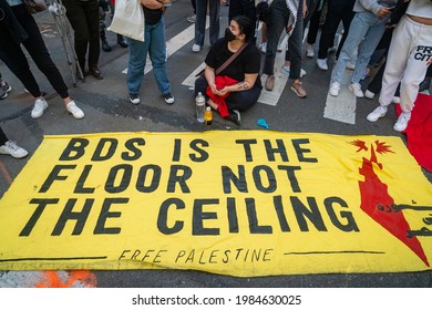NEW YORK, UNITED STATES - May 15, 2021: Pro-Palestine, anti-Israel Boycott, Divestment and Sanctions (BDS) hold a rally in New York during fighting between Israel and Hamas in the Gaza Strip