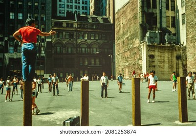 NEW YORK, UNITED STATES MAY 1970: Harlem Street Scene With A Man Preaching It To The People In Front Of Him In 70's