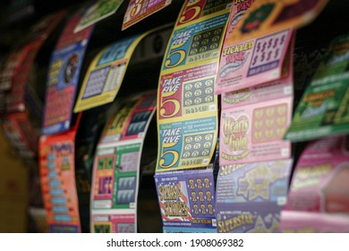 NEW YORK, UNITED STATES - Sep 14, 2003: Wall of scratch-off lottery tickets at a bodega in downtown Manhattan