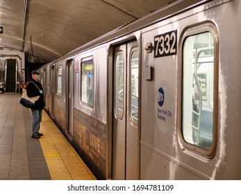 New York, United States, USA March 24, 2020: Subway Station, Grand Central, Man With Mask Waiting For The Train In New York