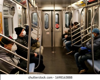 New York, United States, USA March 24, 2020: People With Mask In New York Subway Station During Coronavirus Pandemic Outbreak In March