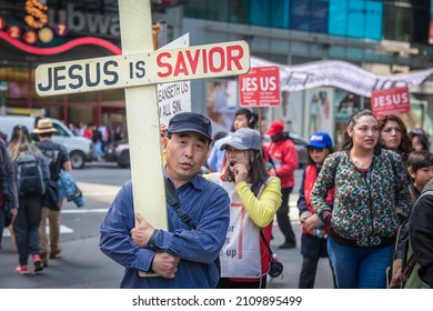 New York, US, April 28 2018 Group of Christians demonstrating on the street with Jesus is Saviour sign in New York in midtown Manhattan