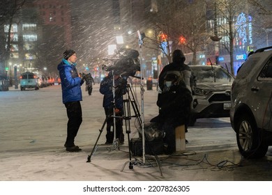 New York, New York, USA 01312021: Meteorologist Chris Bruin Reporting During A Snowstorm In Union Square, NYC