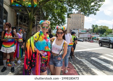 New York, New York USA - 06-27-2021 2 Females Watching The 2021 Nyc Pride Parade