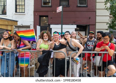 New York, New York  USA - 06-27-2021 A Group Of People Watching The 2021 Nyc Pride Parade