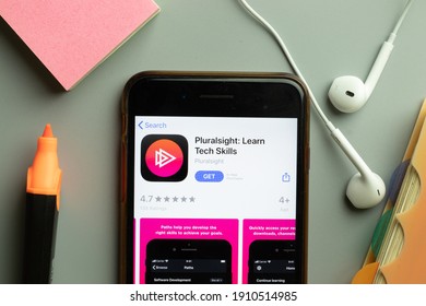 New York, USA - 1 December 2020: Pluralsight Learn Tech Skills Mobile App Icon On Phone Screen Top View, Illustrative Editorial.