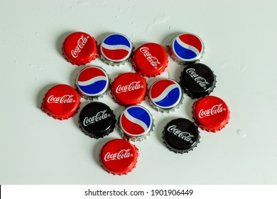 New York, USA - 1 January 2021: Top View Of Pepsi And Coca-Cola Bottle Cap With Logo. Coke Brand, Illustrative Editorial