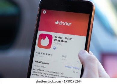 New York, USA - 1 May 2020: Tinder app logo close-up on phone screen, Illustrative Editorial.