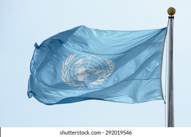 NEW YORK - USA - 11 JUNE 2015 Waving United Nations UN Flag In The Deep Blue Sky Background