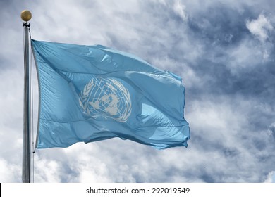 NEW YORK - USA - 11 JUNE 2015 Waving united nations UN flag in the deep blue sky background