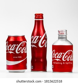 New York, USA 11/01/2020 - Coca-Cola Aluminum Recyclable Bottle And Can Isolated On A White Background In Studio, Coke Brand.