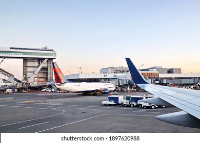 New York ,USA. 18 August 2020. Airport Terminal. Plane Landing And Taxiing To The Place Of Disembarkation Of Passengers.