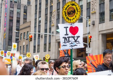 New York, USA - 21 September 2014:  People Marching And Campaigning For Greater Environmental Awareness Of Local Issues During The Peoples Climate March Through New York City