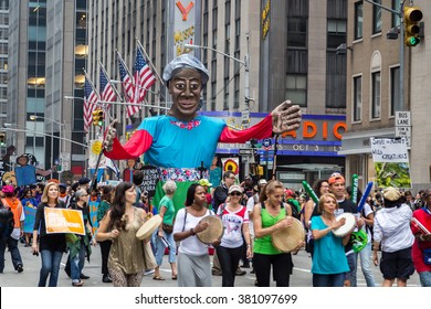 New York, USA - 21 September 2014:  People Carry Large Effigy Representing Mother Earth Whilst Campaigning For Greater Environmental Awareness During The Peoples Climate March Through New York City