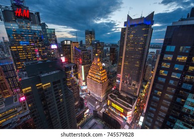 New York, USA - 8 May 2017: Manhattan Times Square Panorama Aerial View At Night With Office Building Skyscrapers Skyline