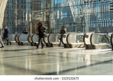 NEW YORK, USA - APR 2019 : Unrecognizable passenger and tourist walking up to the escalator to office in rush hour on April 3, 2019, lower Manhattan,New York, United state