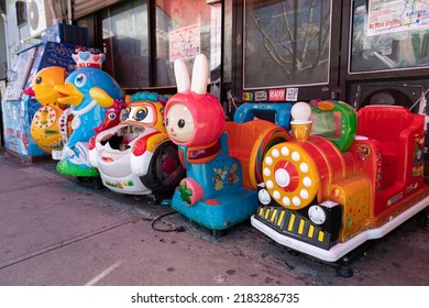 New York, New York USA - April 12 2022: Rides For Children Outside A Bodega On The Lower East Side Of New York City