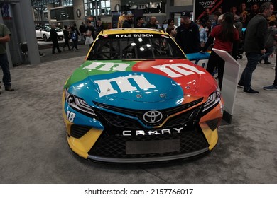 New York, New York, USA - April 23, 2022: Kyle Busch Number 18 Toyota Camry Racecar On Display At The New York Auto Show