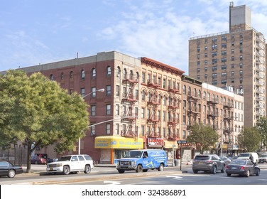 NEW YORK, USA - AUGUST 17, 2015: Street In Harlem District. Since The 1920s, Harlem Has Been Known As A Major African American Residential, Cultural And Business Center. 