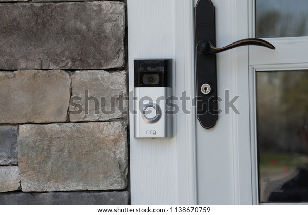 New York, USA - Circa 2018: Ring video doorbell\
owned by Amazon. manufactures home smart security products allowing\
homeowners to monitor remotely via smart cell phone app.\
Illustrative editorial