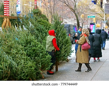 NEW YORK, USA - DEC 8, 2017: Christmas market and sale of Christmas trees on Fifth Avenue in Midtown Manhattan, New York City