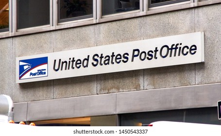 NEW YORK, USA - DECEMBER 14, 2018: Logo And Signage Of USPS On A Wall. United States Postal Service Is An Independent Agenc Of US Federal Government Responsible For Providing Postal Service In The US