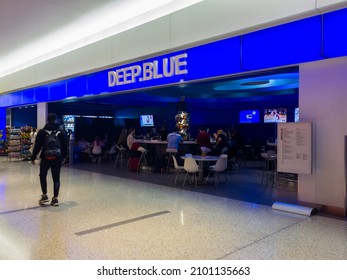 New York, USA - December 25, 2021: Horizontal View of Deep Blue Seafood Restaurant inside Terminal 5 of John F. Kennedy Airport