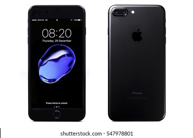 New York, USA - December 28, 2016: Brand new black Apple iPhone 7 Plus front side and backside isolate on background with clipping path.