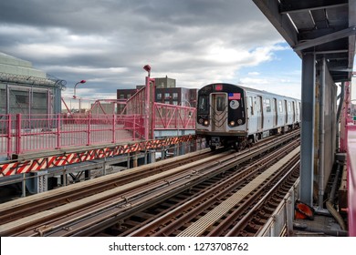 New York, USA, December 3, 2018: A NYC Subway on the Williamsburg Bridge. The Williamsburg Bridge is a suspension bridge across the East River in New York City , USA