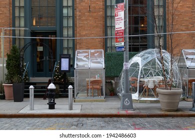 New York, New York USA - December 30 2020: Socially Distant Outdoor Dining Setup During Winter With Domes Outside A Restaurant In The Meatpacking District Of New York City During The Covid 19 Pandemic