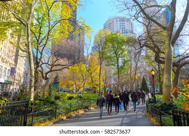 New York, USA: December 4, 2016 : There Are Some People Walking Inside Bryant Park In Autumn Season.