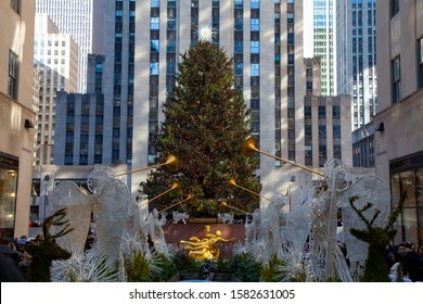 New York, New York / USA - December 7, 2019: The Angels And Christmas Tree In Front Of Rockefeller Center.