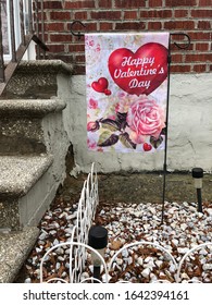 New York, New York / USA - February 11 2020: Closeup Of Valentine's Day Garden Flag In Front Of A House In Queens, NY