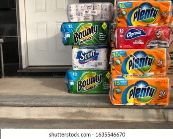 New York, New York / USA - February 2 2020: Stacked Packages Of Paper Products Outside Of A Bodega In Queens, NY