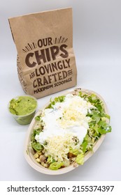 New York, New York USA - January 5 2022: Chipotle Burrito Bowl With Chips And Guacamole On A White Background