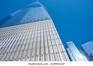 New York, USA - July 05, 2018: Close Up Picture Of One World Trade Center (also Known As One WTC Or Freedom Tower) Against The Blue Sky.