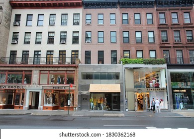 NEW YORK, USA - JULY 1, 2013: People Visit Fashion Stores Along Madison Avenue, New York. Madison Avenue Is One Of The Most Recognized Fashion Shopping Destination In The World.